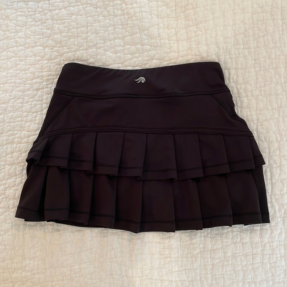Black ruffle athletic skirt, size medium girls, fits a size small woman
